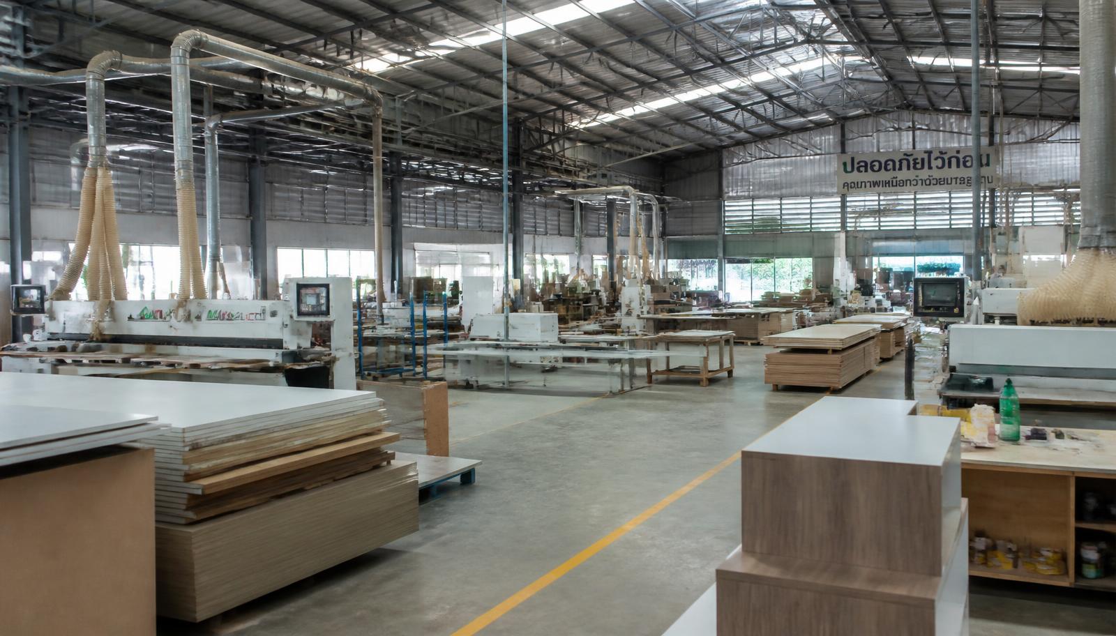 Production floor of the Vision workshop with machinery and sheet material
