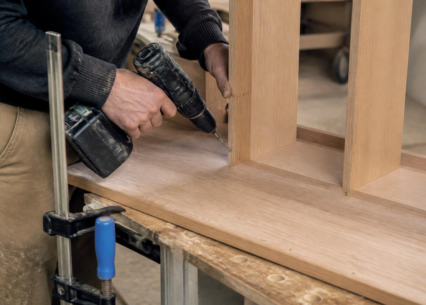 Cabinet being assembled by hand in the workshop